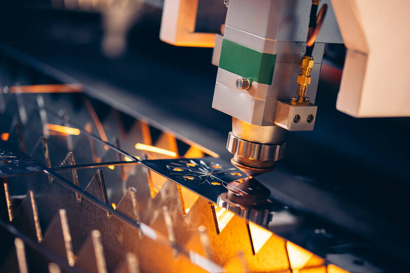 Plasma CNC cutting backlit symbol shapes in metal